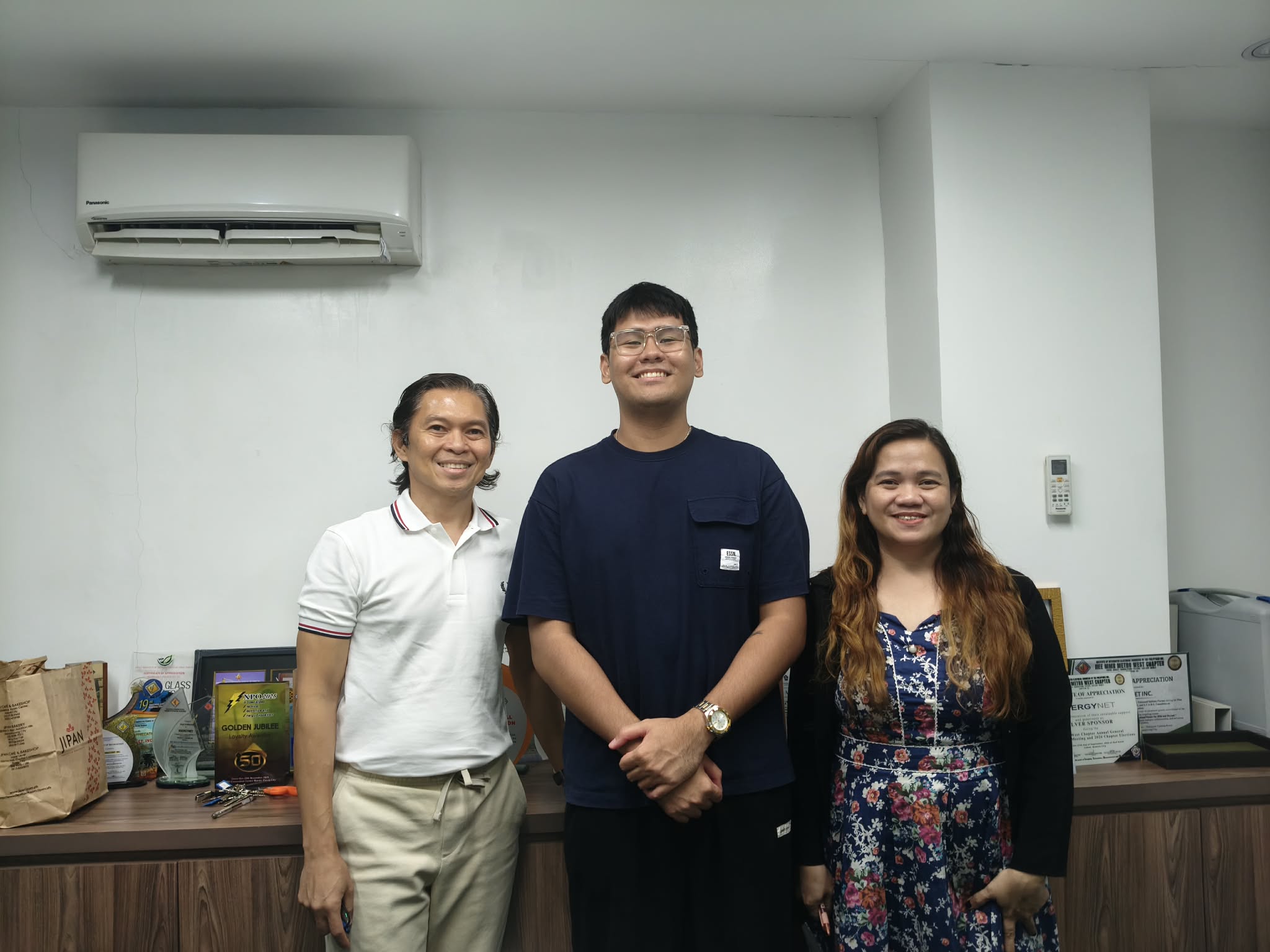 BuildFast Labs founder Carl Saguinsin with EnergyNet Inc.'s CEO and accounting supervisor at their custom software kickoff meeting